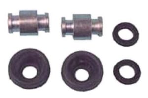 Torque spider repair kit components, with metal cylinders and black rubber pieces