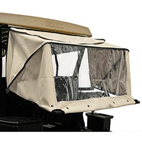 Beige linen golf cart club protector installed under a tan roof; a large clear rear window is visible.